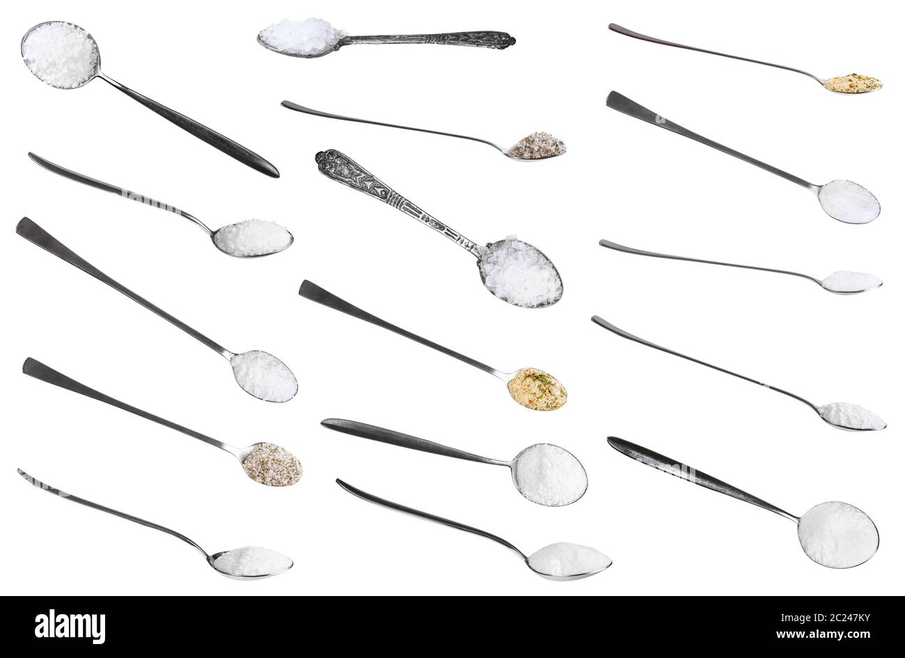 collection from metal spoons with various salts isolated on white background Stock Photo