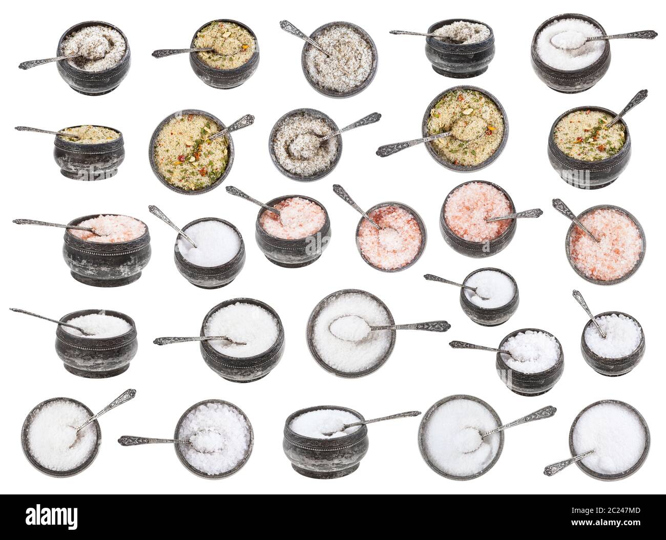 set from old vintage silver salt cellar with spoon with various salts isolated on white background Stock Photo