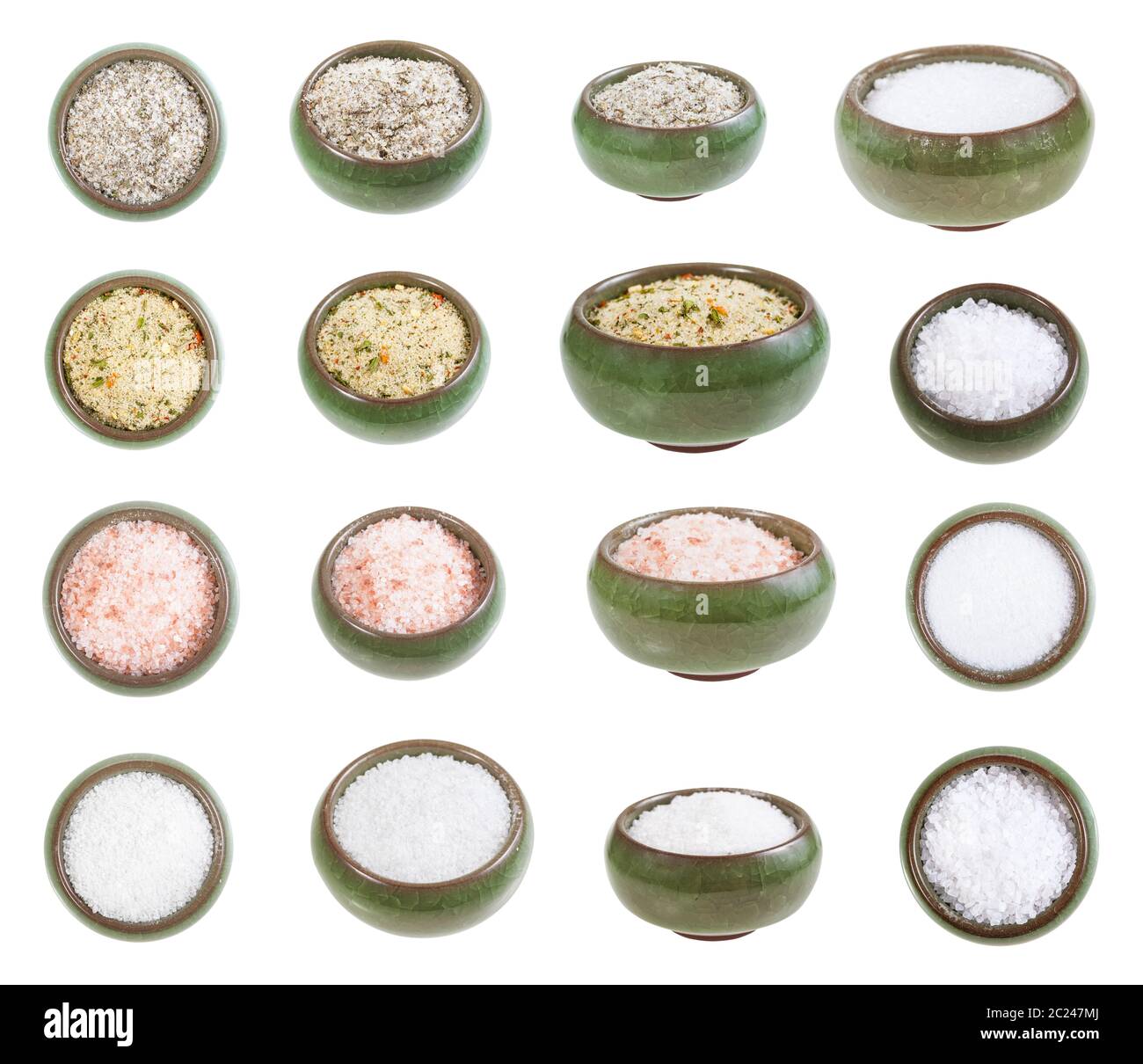 collection from ceramic salt cellar with various salts isolated on white background Stock Photo