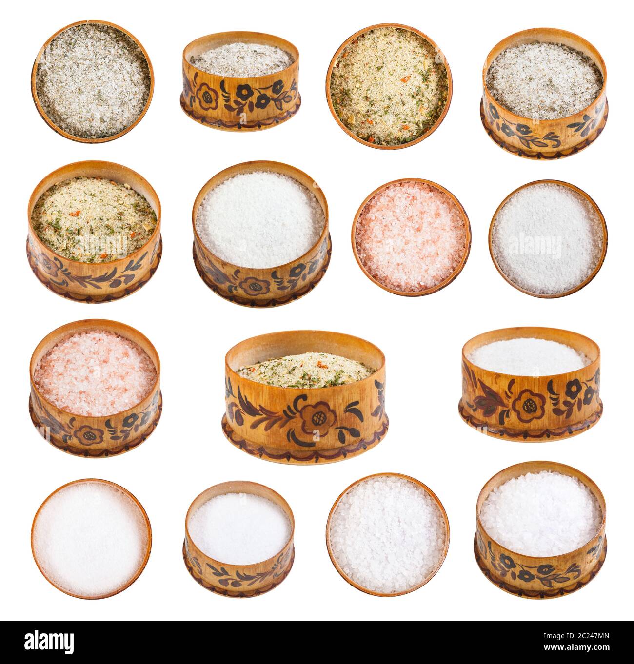 collection from wooden salt cellar with various salts isolated on white background Stock Photo