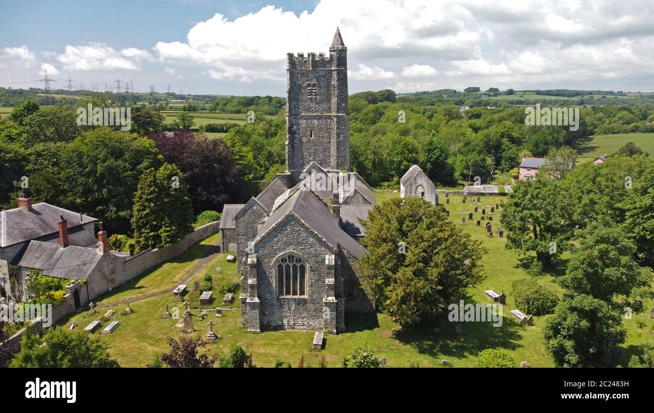 Aerial View of Carew Cheriton St Mary's Church, with the Old Mortuary Chapel on the right, Carew, Pembrokeshire, Wales,UK Stock Photo