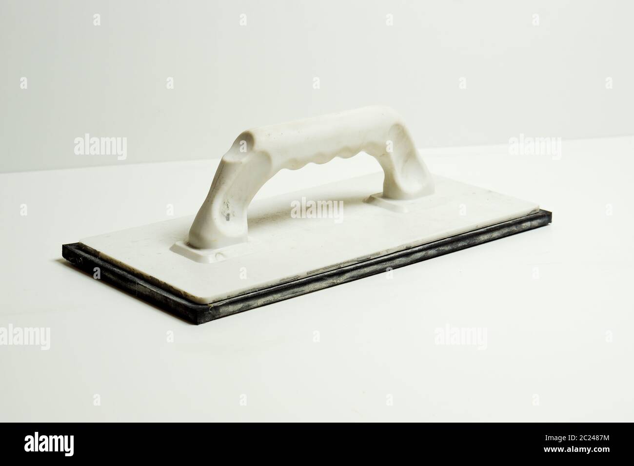 Moss rubber pad for grouting tiles Stock Photo Alamy