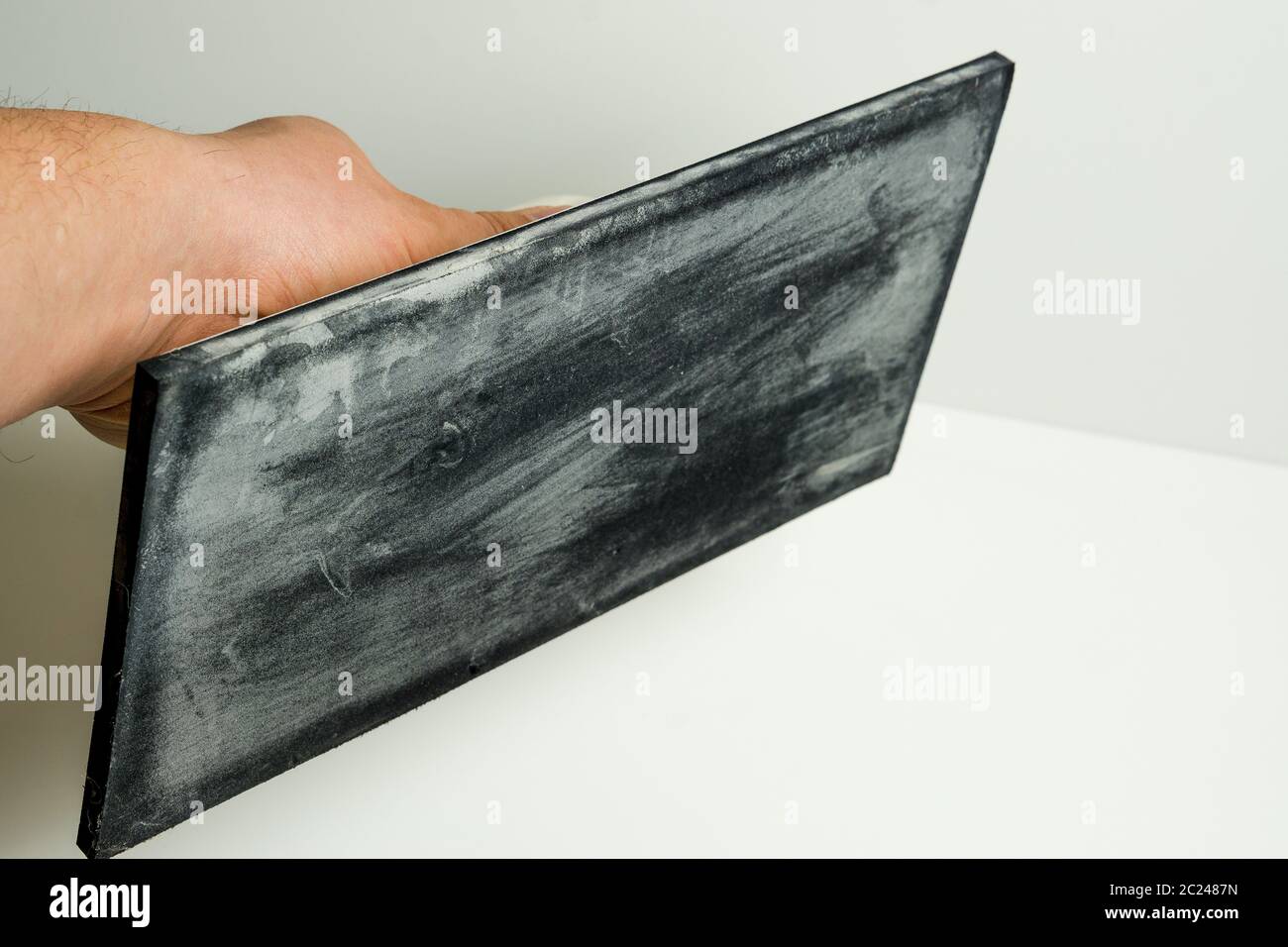 Moss rubber pad for grouting tiles Stock Photo Alamy