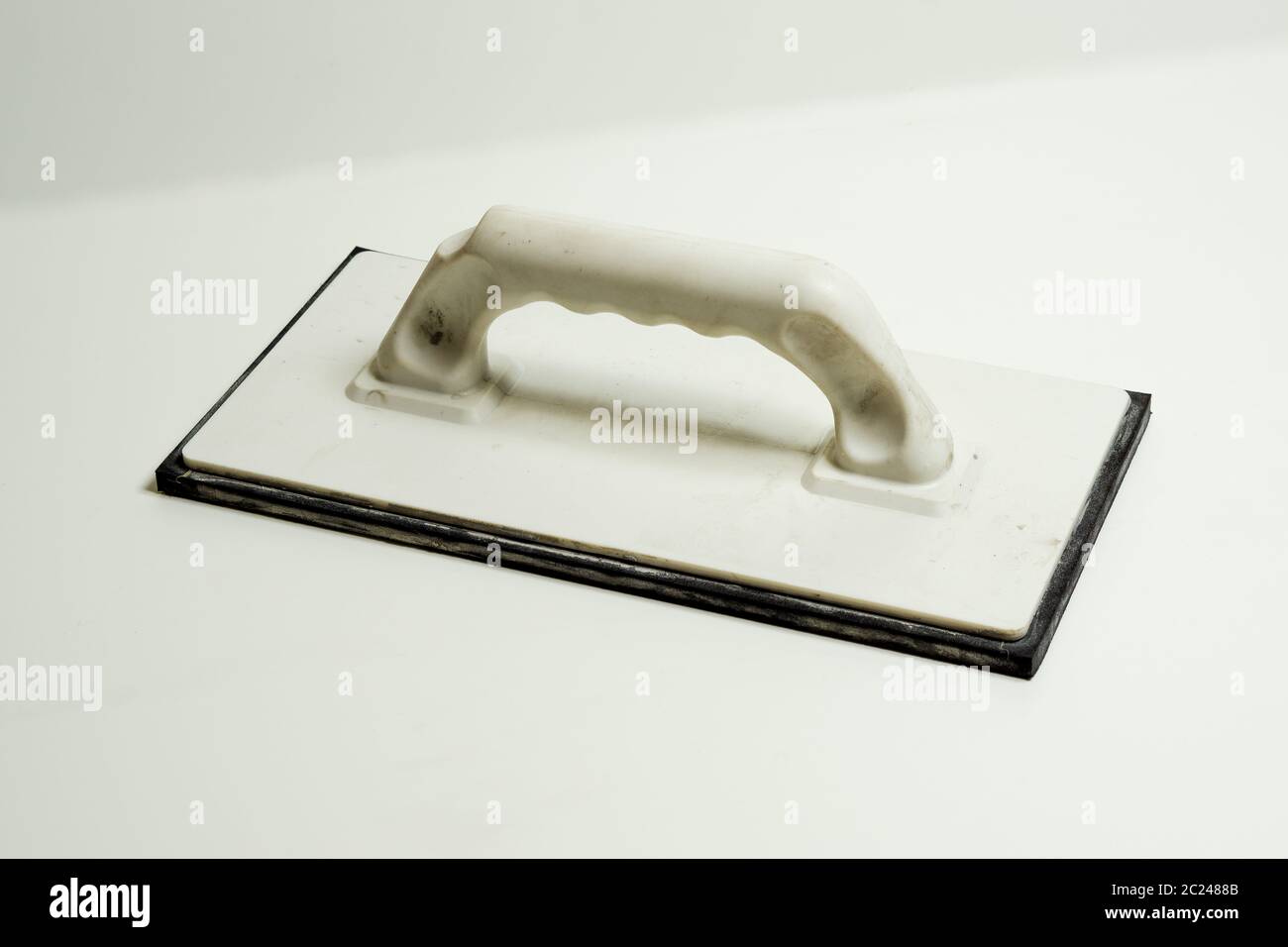 Moss rubber pad for grouting tiles Stock Photo Alamy