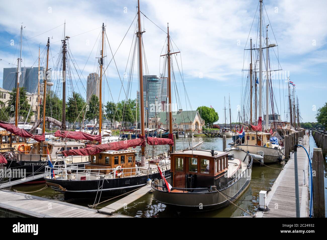 Yachts and sail boats in Rotterdam harbour close to Westplein