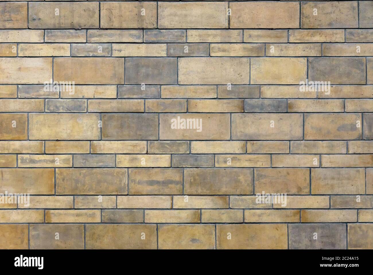 Background made of yellow brick wall texture Stock Photo - Alamy