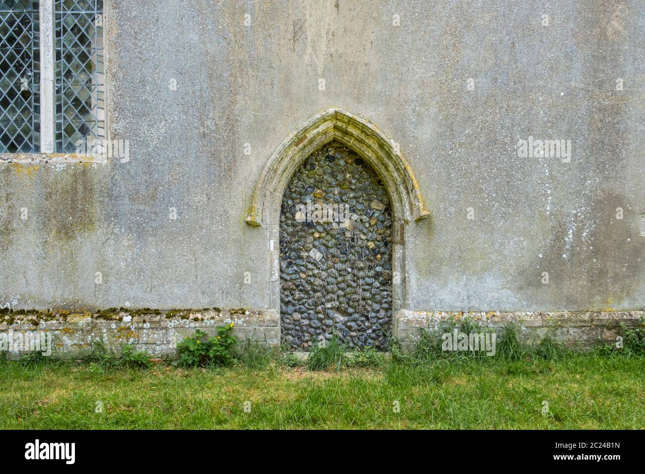 St Nicholas' Church, Oakley, Suffolk, with a door blocked and bricked