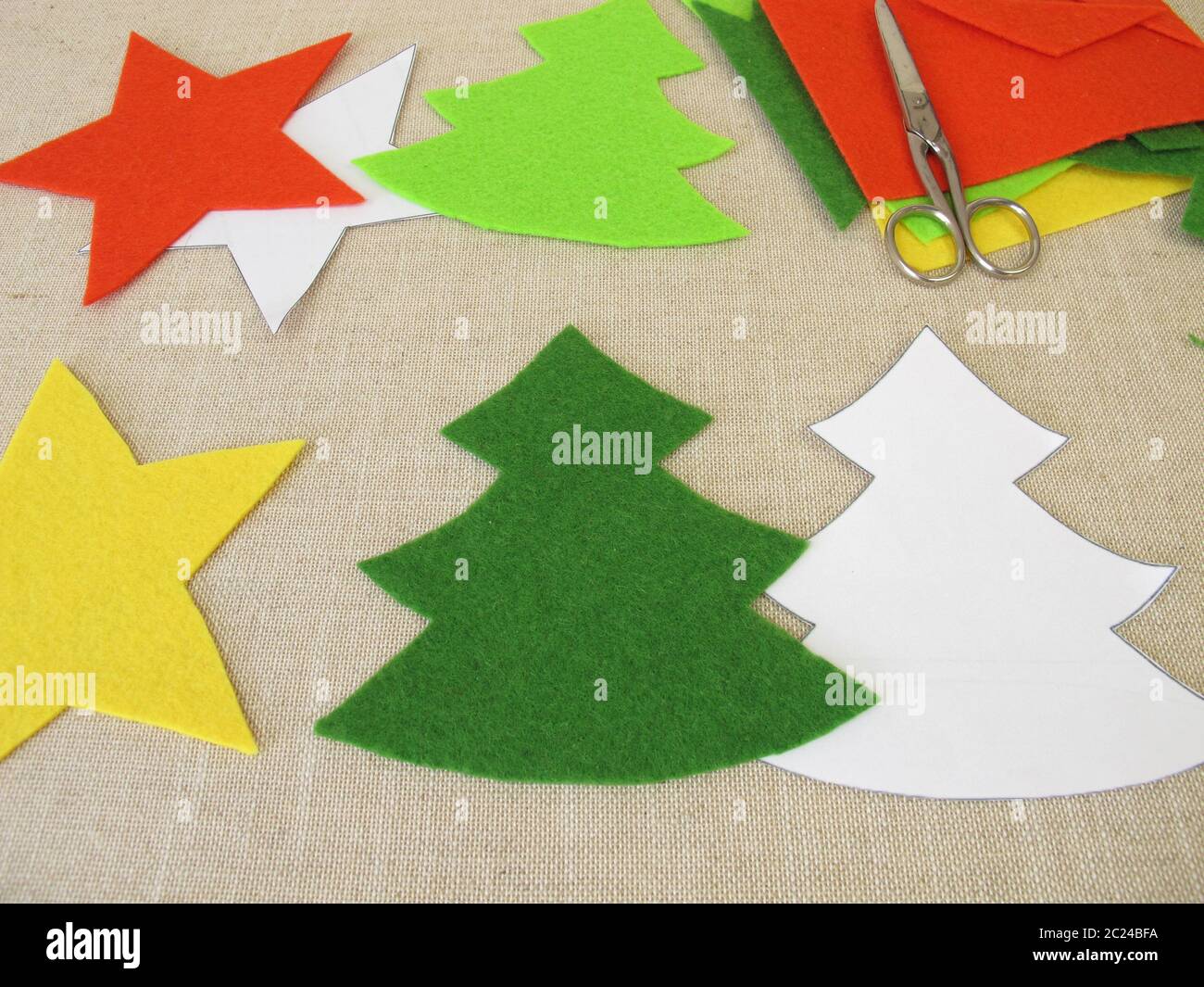 Handmade christmas stars and christmas trees made of felt Stock Photo