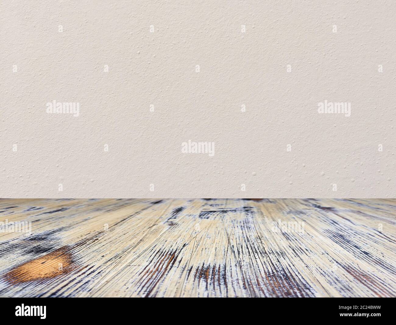 washed wood table with concrete texture background. Stock Photo