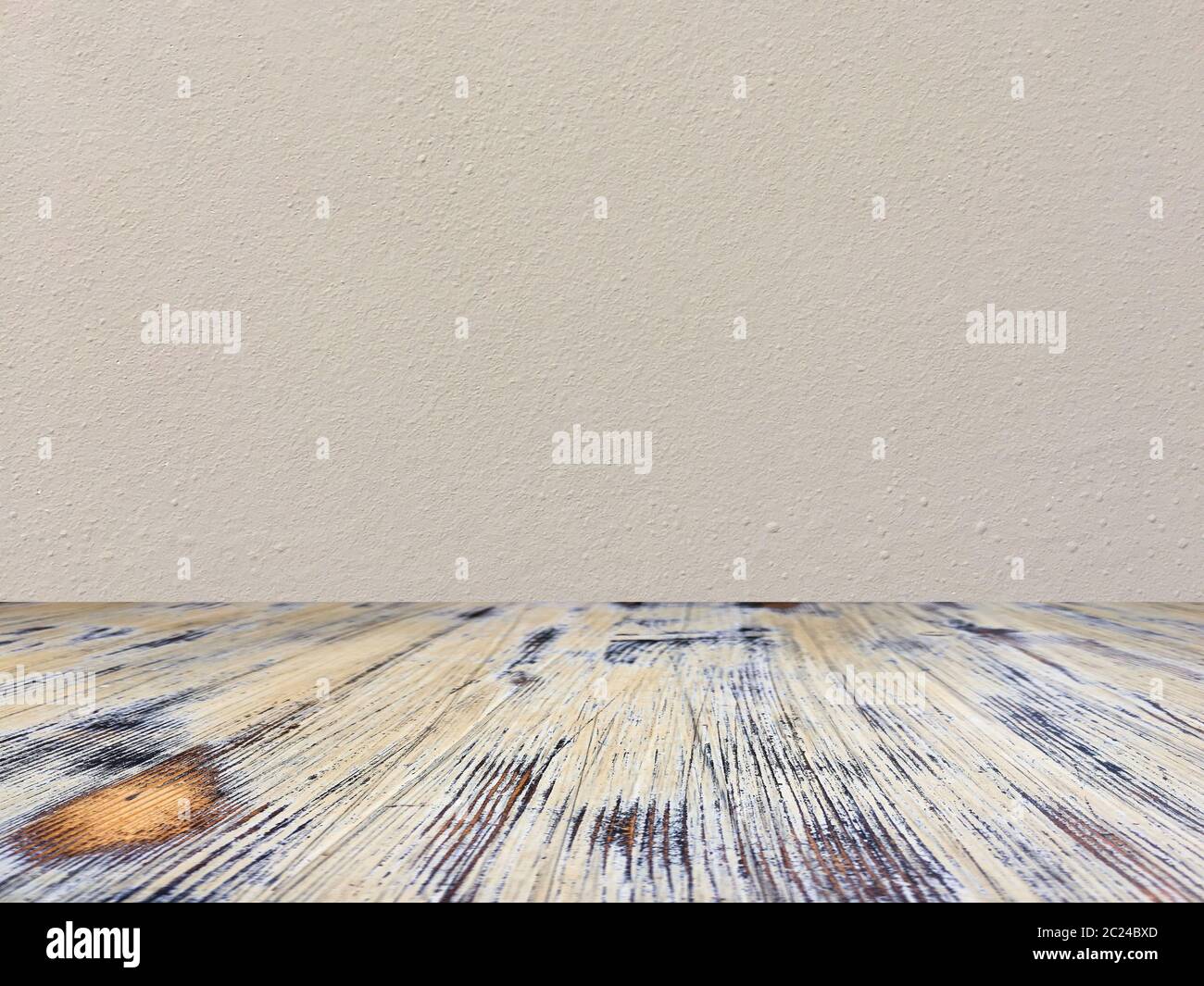 washed wood table with concrete texture background. Stock Photo