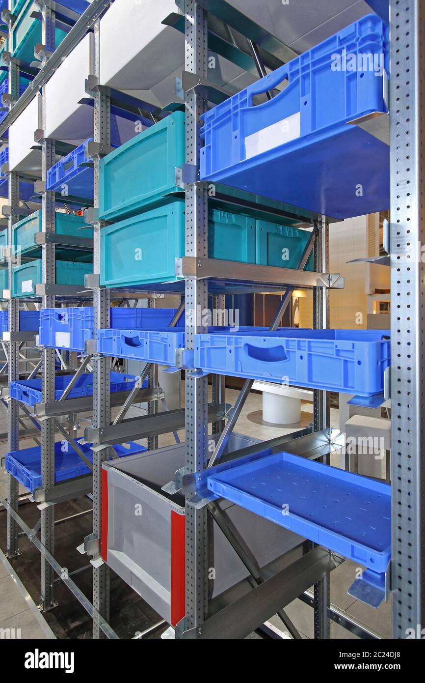 Plastic Crates and Boxes at Storage Shelving Warehouse Stock Photo Alamy