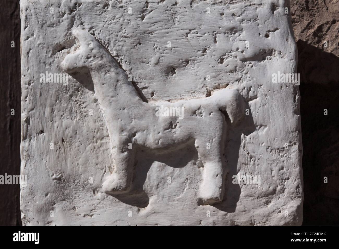 Lama Visual Sign White stone sign as a work of art shows form of lama Stock Photo - Alamy