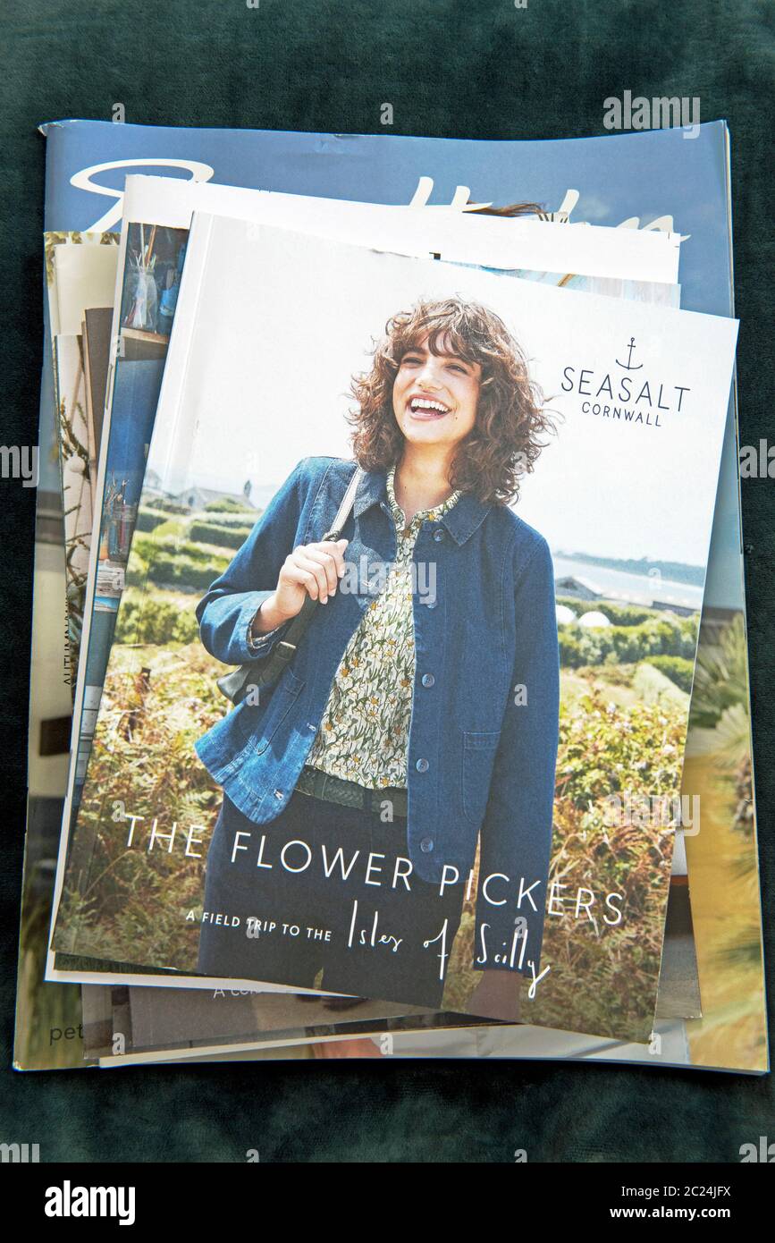 Pile of ladies clothing catalogues with Seasalt booklet on top.  Editorial use only. Stock Photo