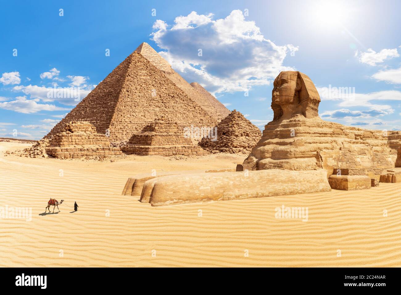 The Pyramids and the Sphinx in the sunny desert of Giza, Egypt Stock ...