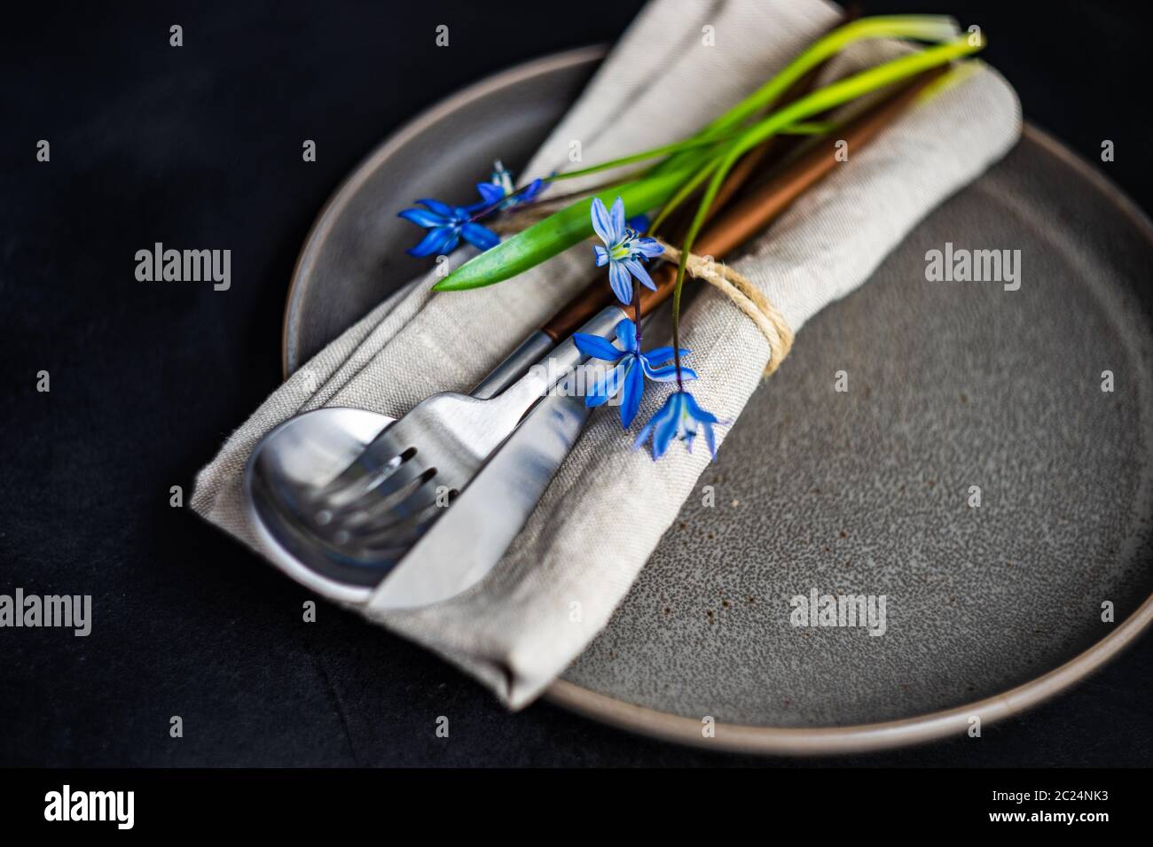 Spring table setting with blue scilla siberica Stock Photo