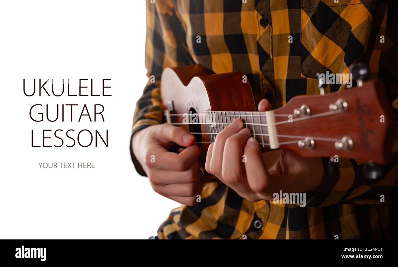 A man playing ukulele in close up view. Template design with sample text Stock Photo