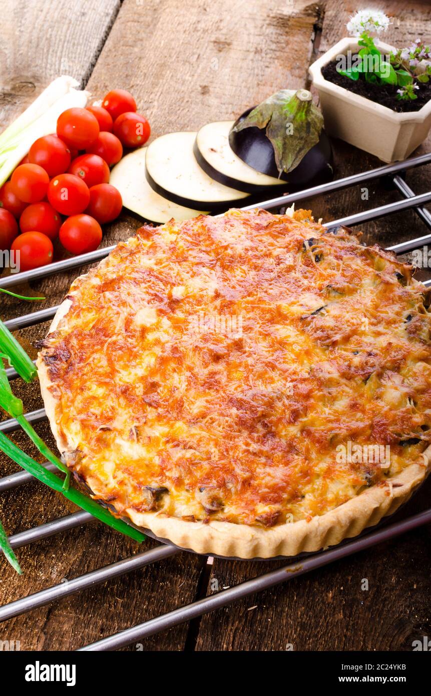 French Quiche with eggplant, leeks and spring onions, bathed in a