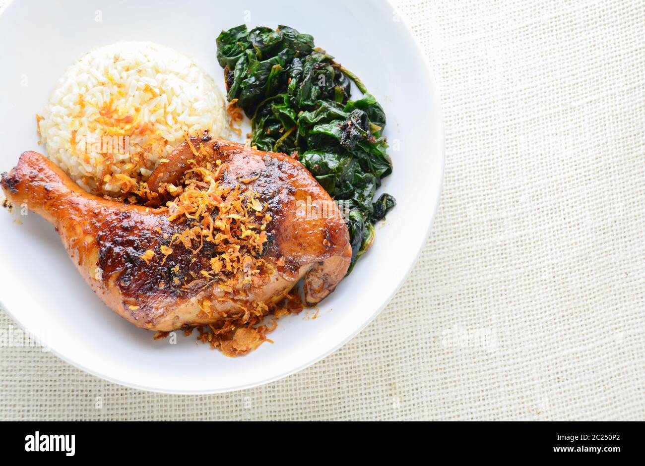 Chicken drumstick marinated with spicy chilli sauce and herbs Stock Photo
