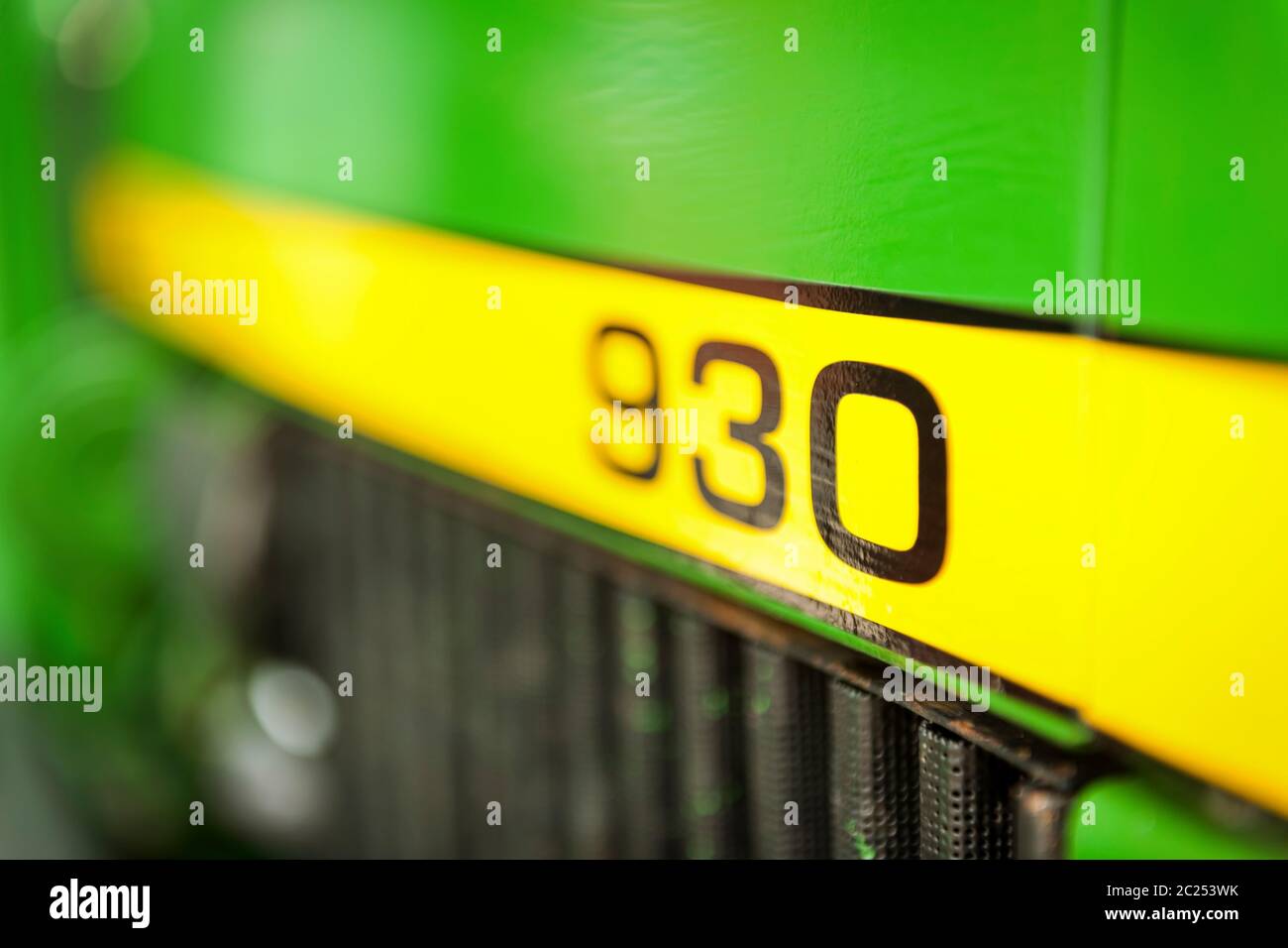 Number on the hood of a green American-made tractor. Stock Photo