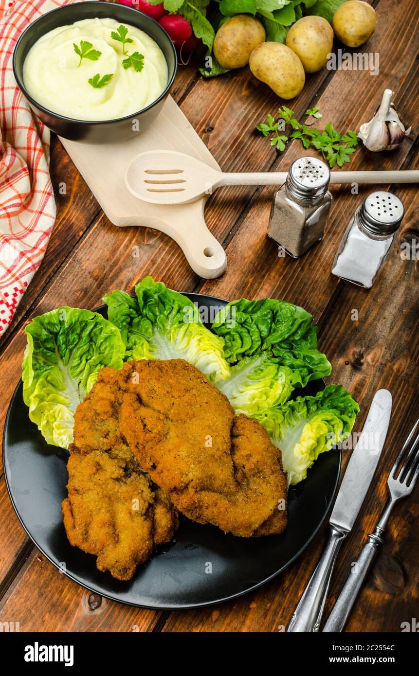 Wiener Schnitzel with mashed potato, veal meal, original and delicious