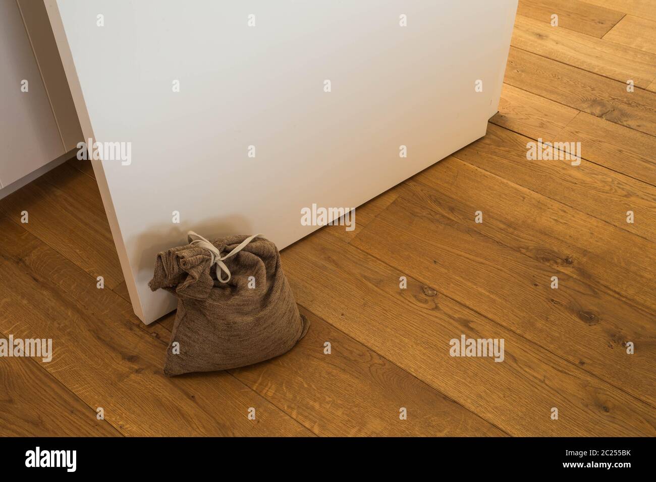 Door stopper on laminate floor.Door stopper to prevent bumps while