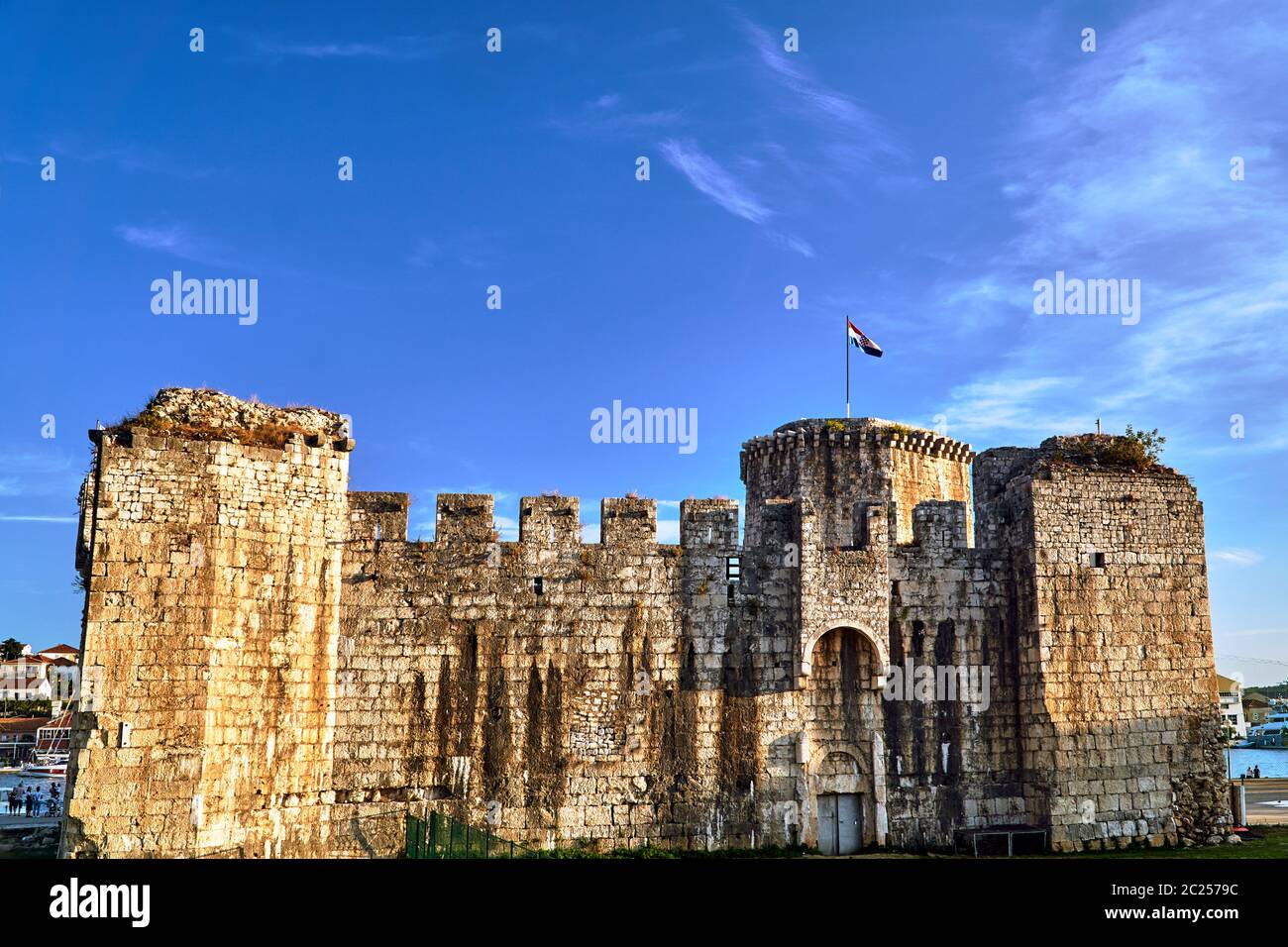 Tower and walls of Venetian fortress in the town of Trogir in Croatia Stock Photo