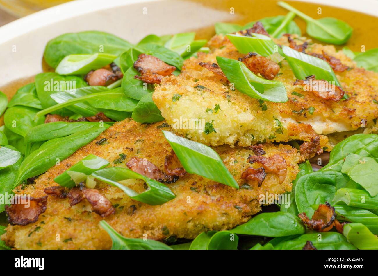 Rabbit steaks with herbs and sour cream, mustard mayonnaise, sprinkled