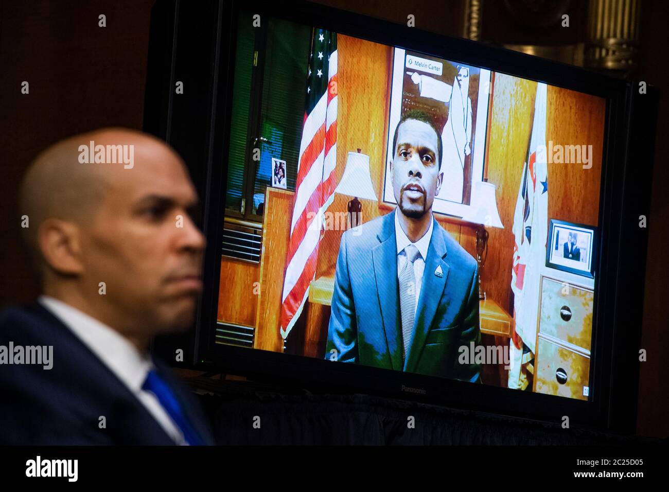 Washington, DC. 16th June, 2020. Melvin Carter, mayor of St. Paul, Minn., testifies remotely as United States Senator Cory Booker (Democrat of New Jersey), looks on, during the US Senate Judiciary Committee hearing titled 'Police Use of Force and Community Relations,' in Dirksen Senate Office Building in Washington, DC, on Tuesday, June 16, 2020. Credit: Tom Williams/Pool via CNP | usage worldwide Credit: dpa/Alamy Live News Stock Photo