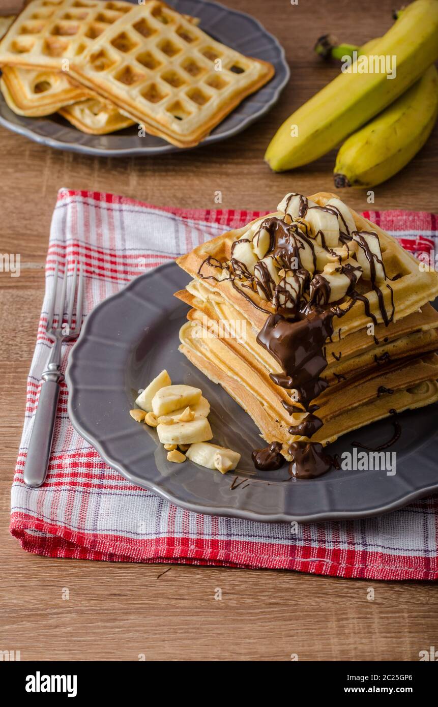 The original Belgian waffles with bananas, nuts and chocolate Stock ...