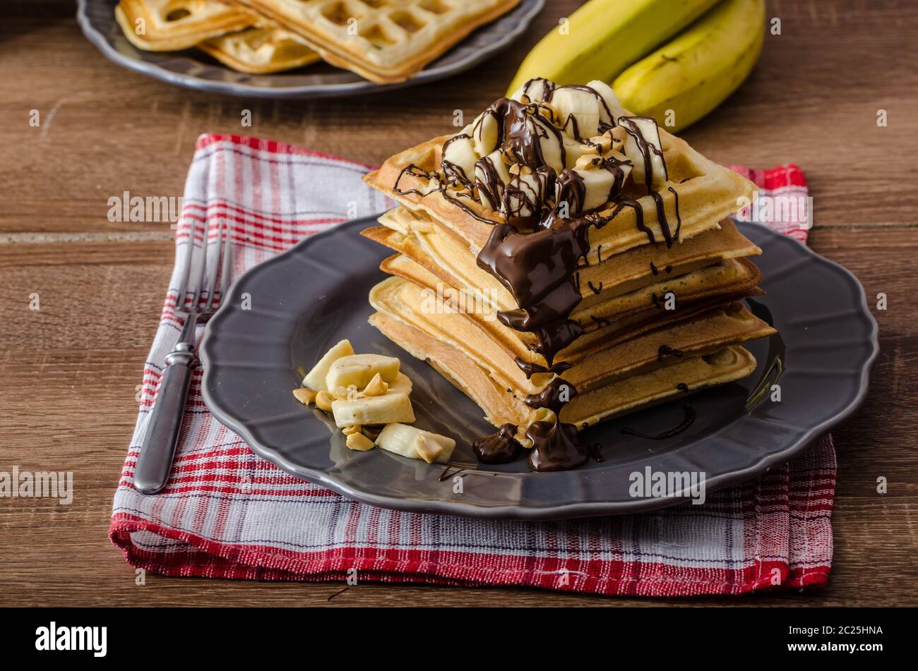 The original Belgian waffles with bananas, nuts and chocolate Stock ...