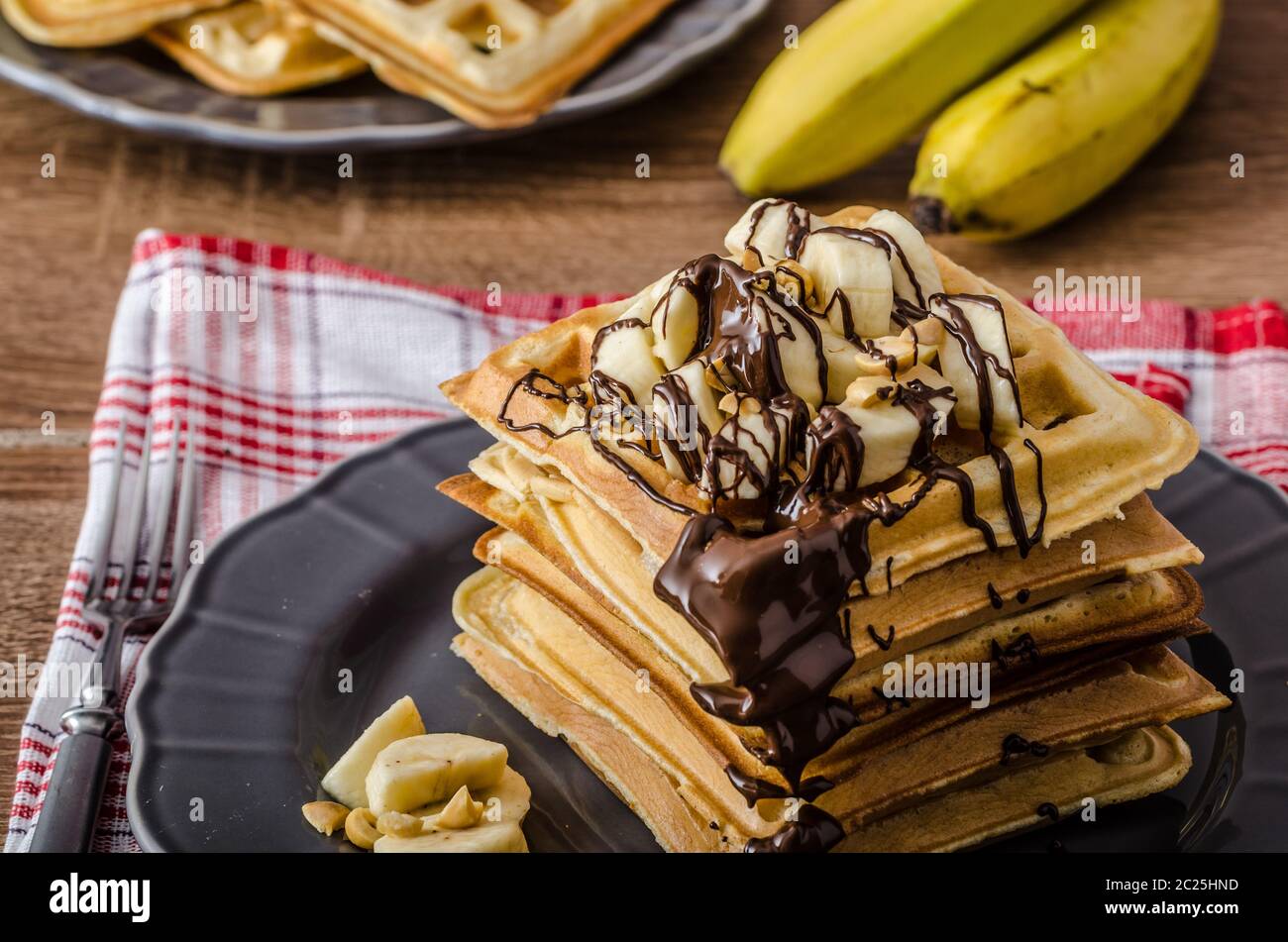 The original Belgian waffles with bananas, nuts and chocolate Stock ...