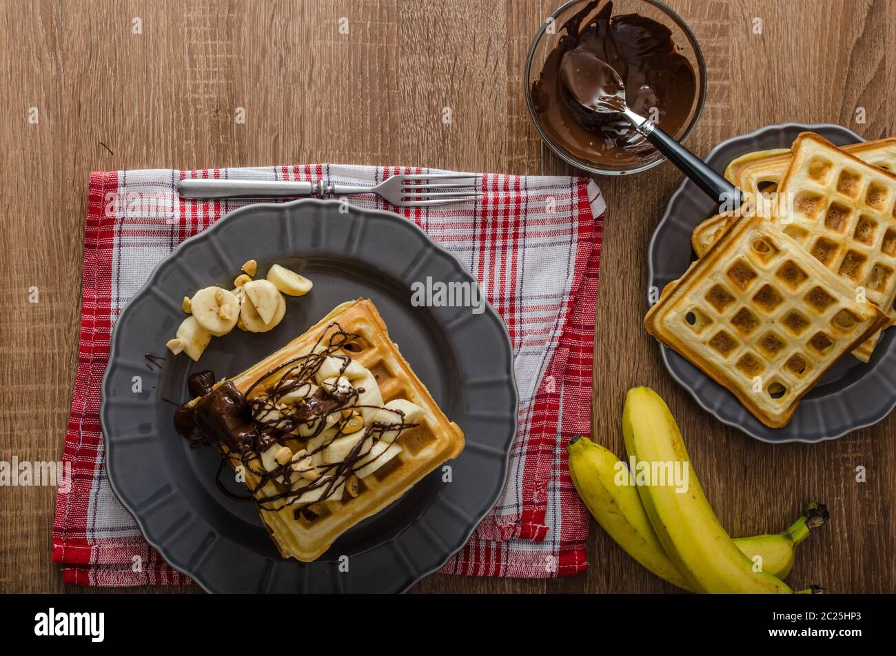 The original Belgian waffles with bananas, nuts and chocolate Stock ...