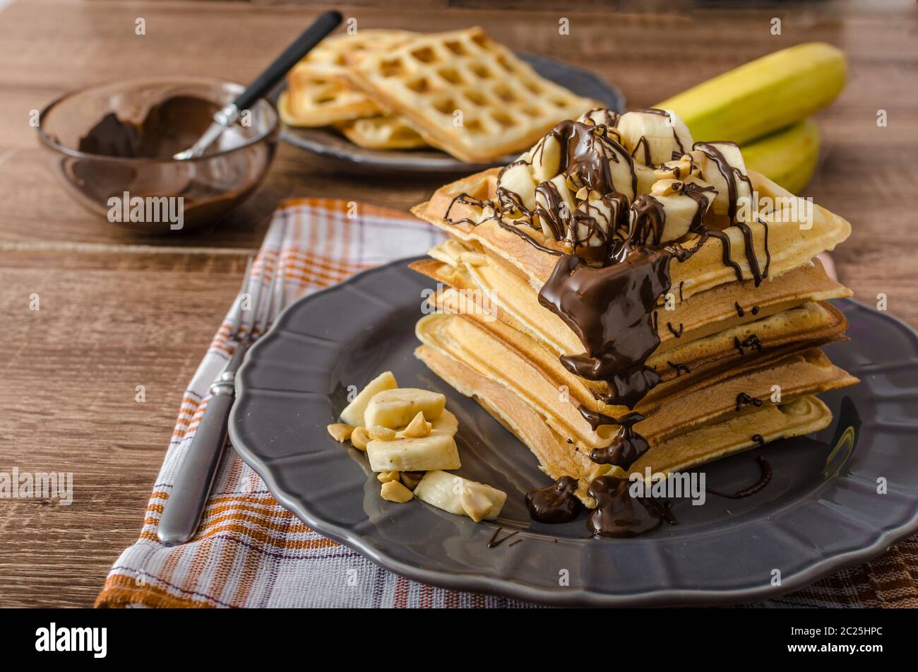 The original Belgian waffles with bananas, nuts and chocolate Stock ...