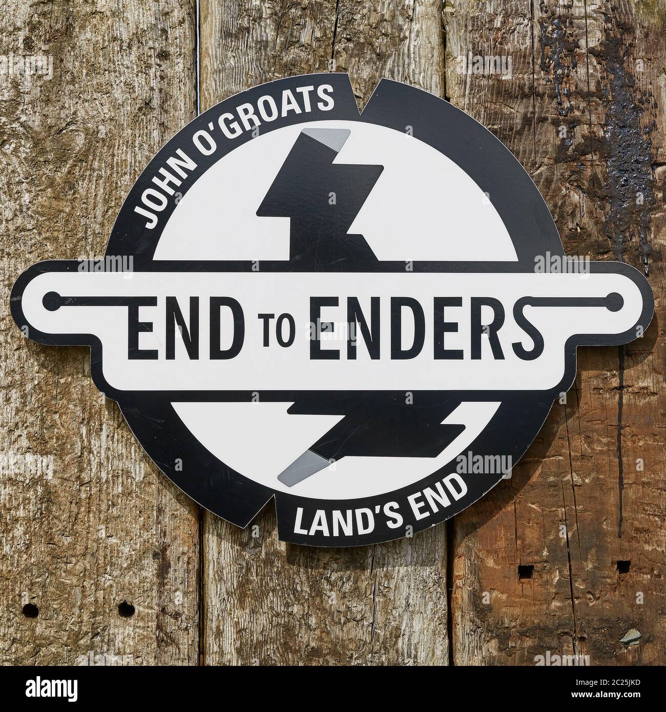 Land's End to John O'Groats sign on wooden background. The nothermost part of mainland in Scotland. Stock Photo