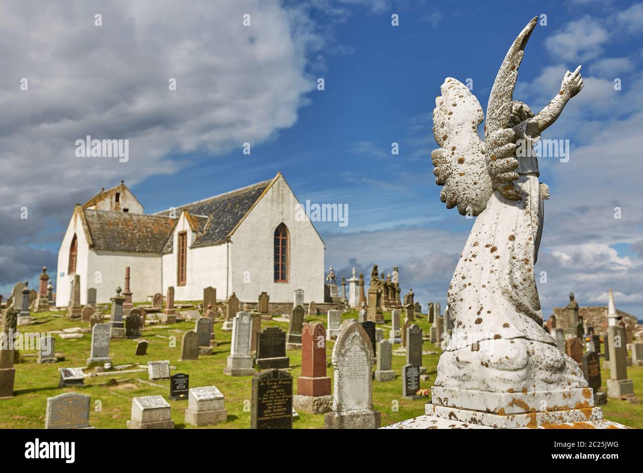 Graveyard at Canisbay church, the most northerly parish church on the Scottish mainland, near John O Stock Photo