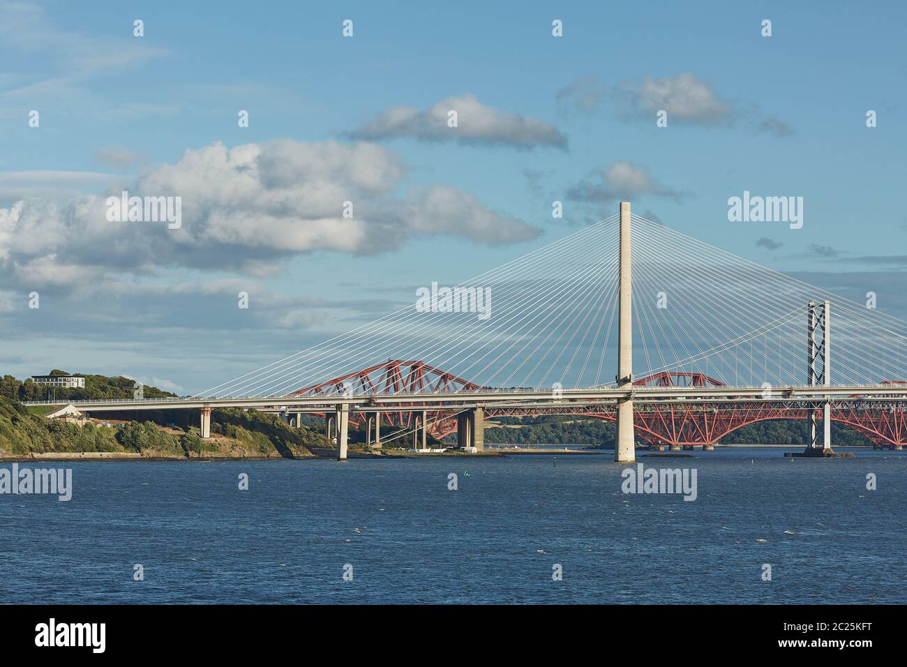 The new Queensferry Crossing bridge over the Firth of Forth with the older Forth Road bridge and the Stock Photo