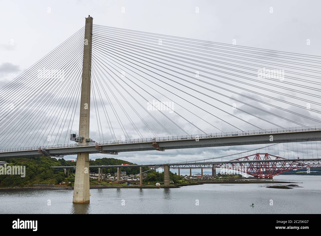 The new Queensferry Crossing bridge over the Firth of Forth with the older Forth Road bridge and the Stock Photo