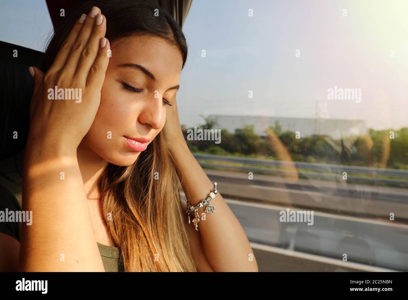 Young woman suffer sickness during travel on bus. Motion sickness