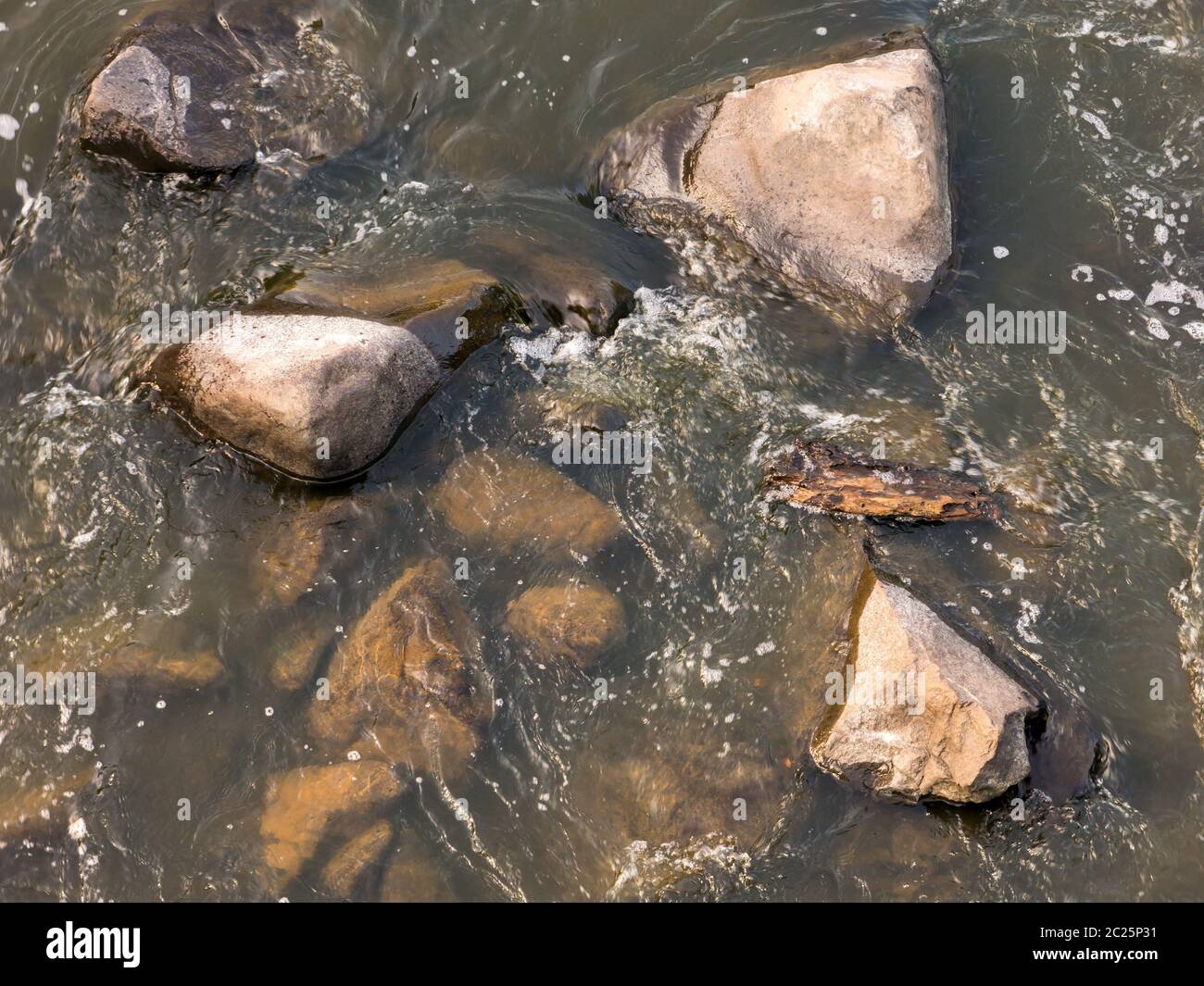 Rocks on water Stock Photo - Alamy