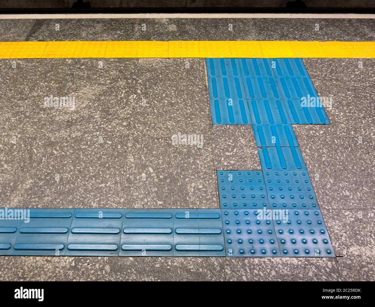 Tactile Ground Surface Indicators for visually impaired in brazilian subway station Stock Photo