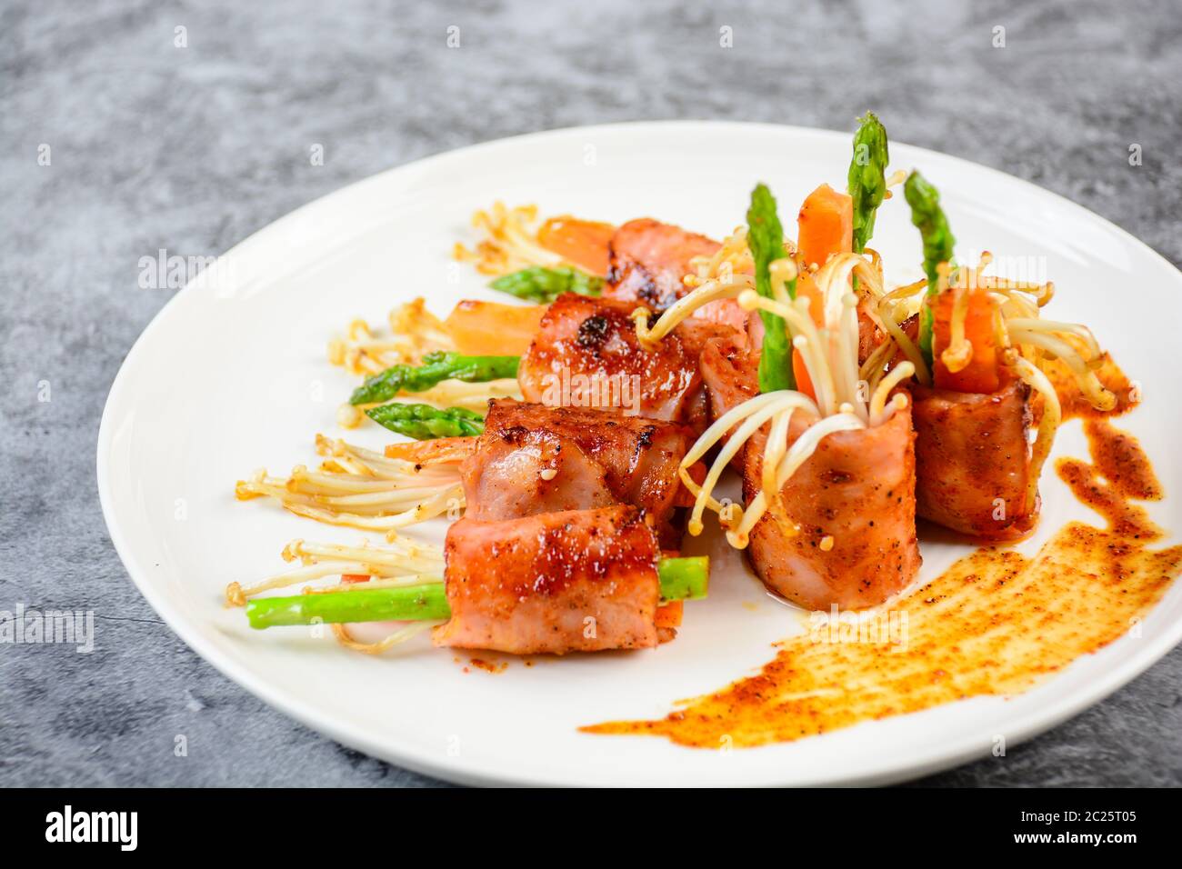 Bacon Wrapped Stuffed Mushrooms Stock Photo - Alamy