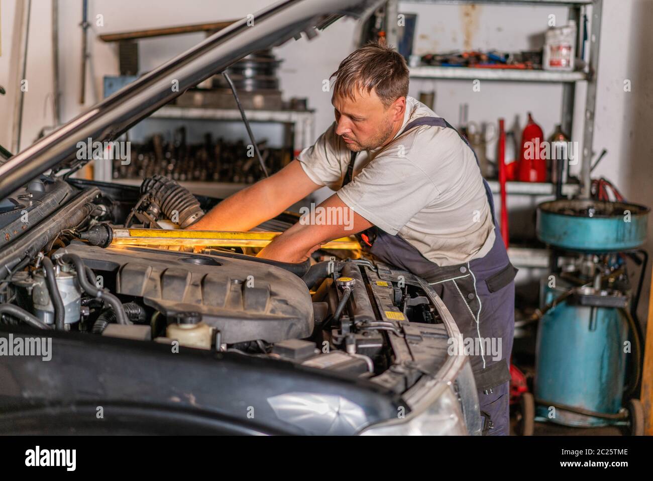Mechanic inspect car hi-res stock photography and images - Alamy