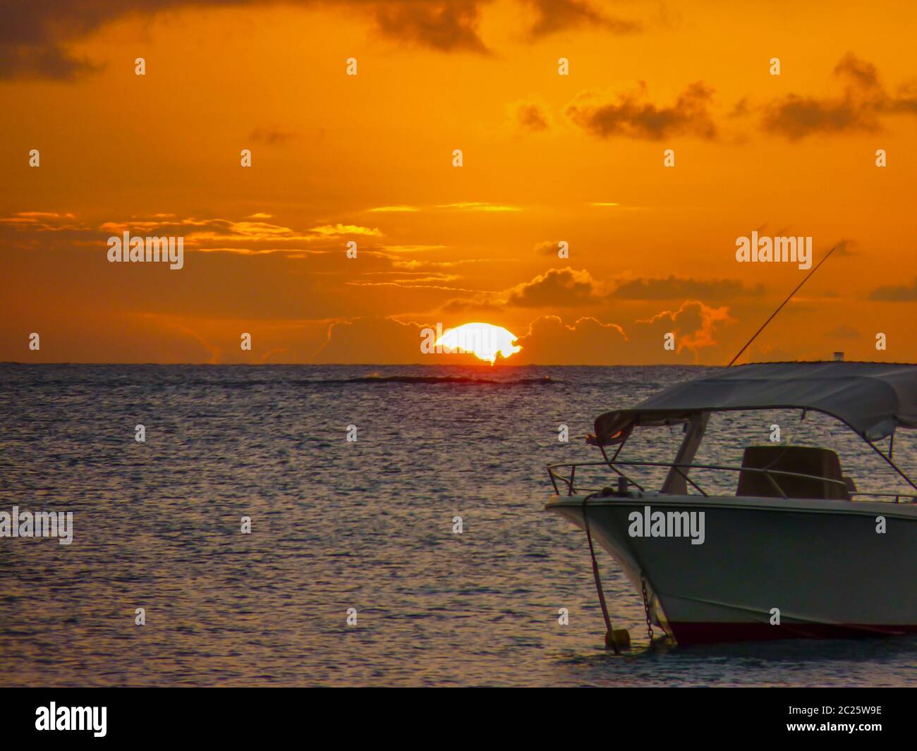 Sunset on the Indian Ocean in Grand Baie, Mauritius Island Stock Photo ...