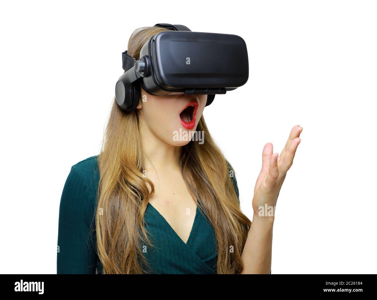 Wondering Young Woman in Virtual Reality Glasses over white background.  Shocked Girl wearing VR device. Close-up portrait of Female with VR headset  Stock Photo - Alamy