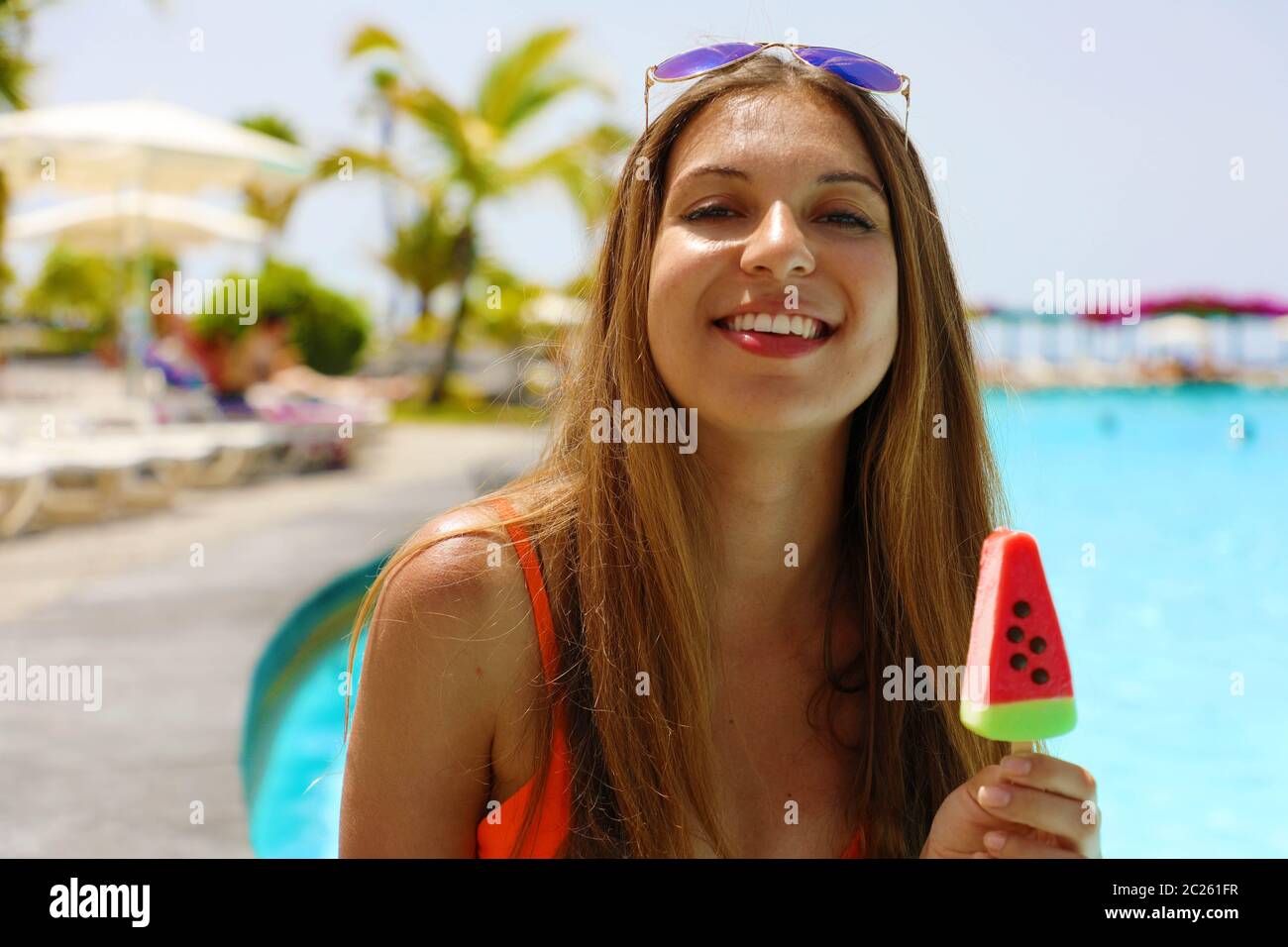 Smiling Beautiful Girl Eating Popsicle Ice Pop In Form Of Watermelon