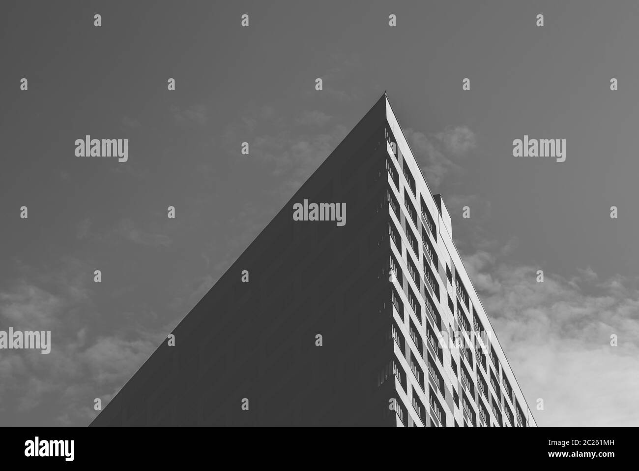 Angle of the Skyscraper on the Cloudy Sky Background. Black and White ...