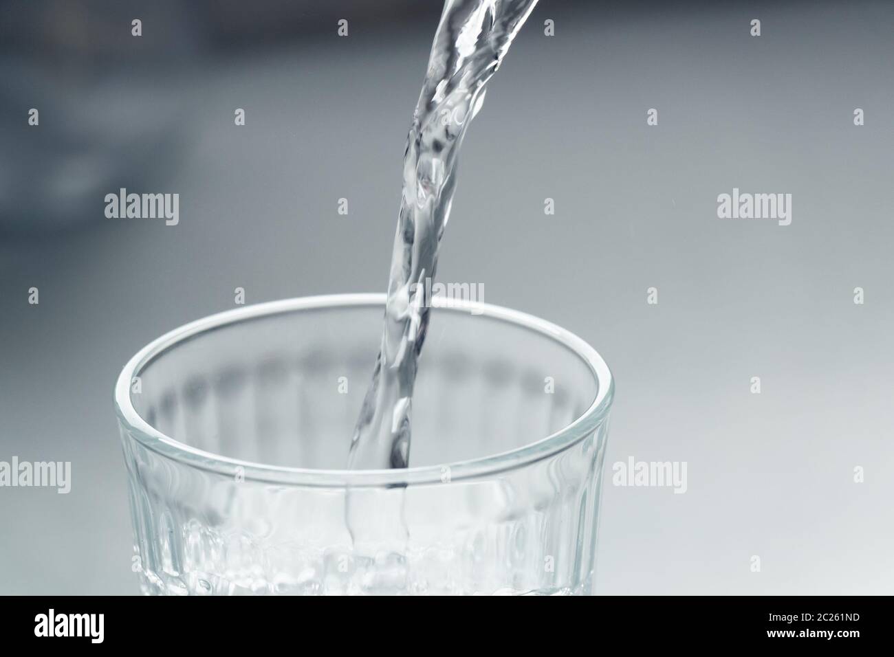 pour a glass of water Stock Photo