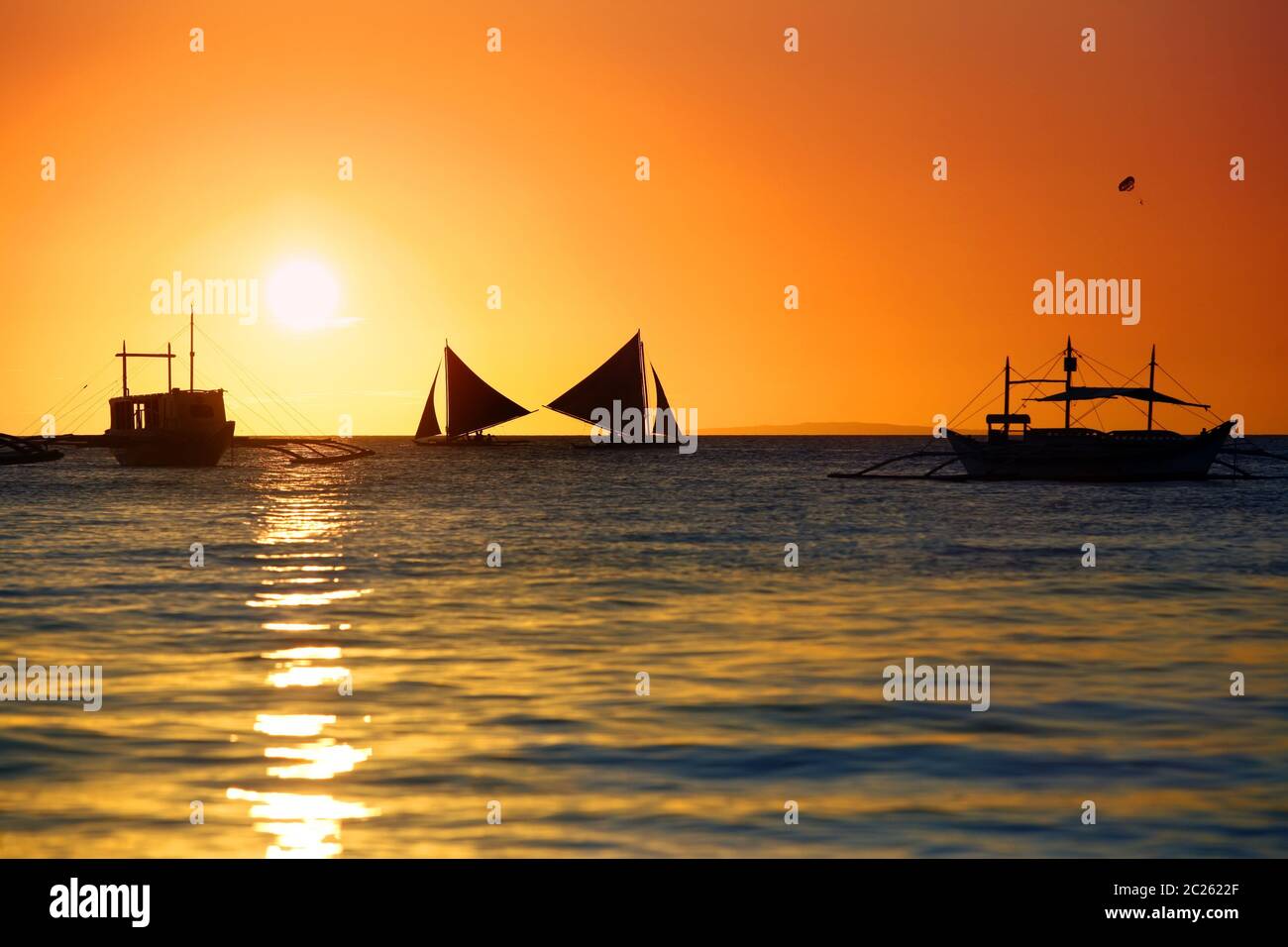 Traditional Philippine boats on sunset. Island Boracay Stock Photo