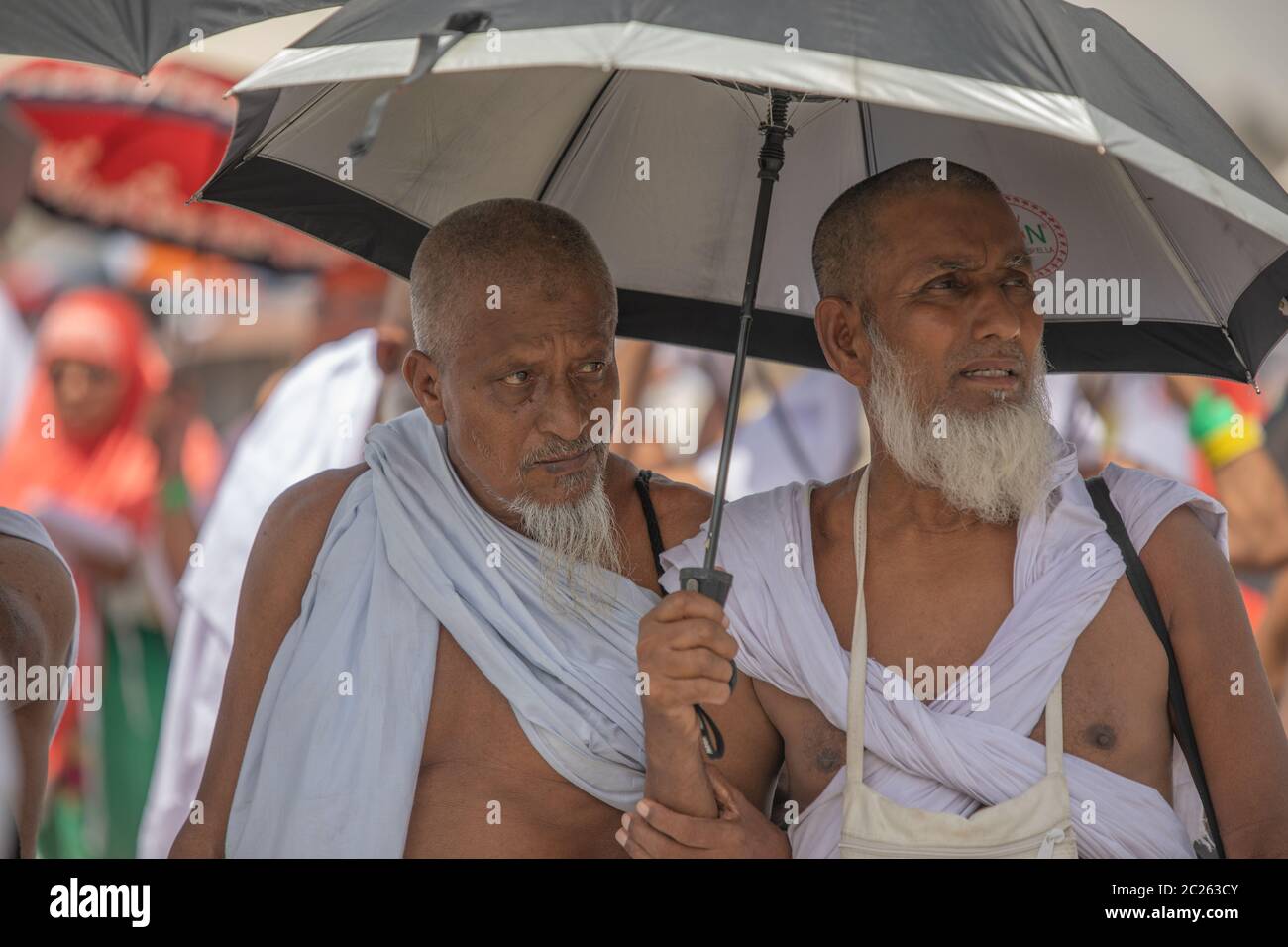 old man in Hajj season Pilgrims in day time, Performing Hajj, Mina ...