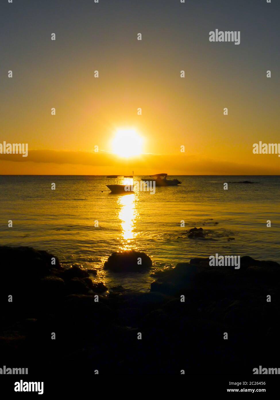 Sunset on the Indian Ocean in Grand Baie, Mauritius Island Stock Photo ...